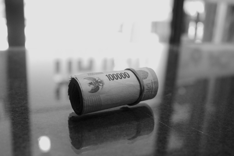bottle, single object, pay, communication, message, still life, close-up, money, capital letter, salary, wall - building feature, focus on foreground, paper