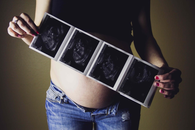 belly picture, pregnant, indoors, standing, mother, anticipation, woman, holding, one person, results, beginnings, females, parent, body part, child, adult