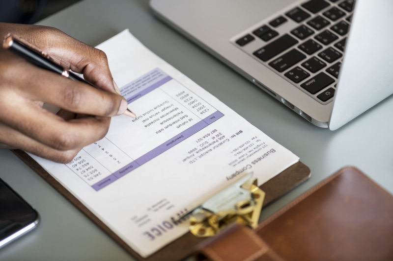 computer equipment, financial, keyboard, one person, wireless technology, communication, paper, tax, macbook pro, 2K, datum, human hand, investment, pen