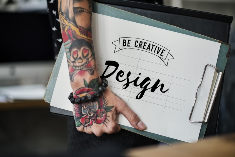 western script, designer, human hand, social issues, adult, 4K, be creative, one person, design, human body part, hand, woman, message, art and craft