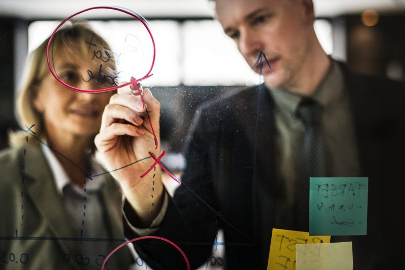 looking, occupation, westerner, indoors, males, portrait, clear, briefing, writing, glass, front view, one person, text, office, focus, businessman, board