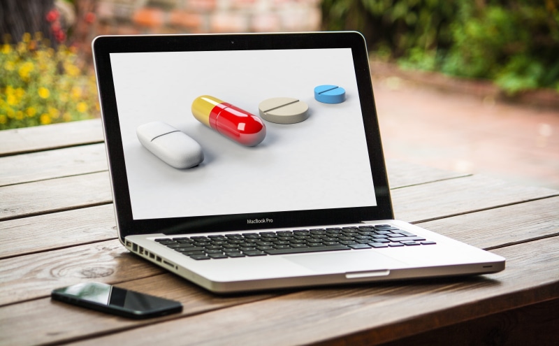 medicine, purchase, capsule, keyboard, communication, computer network, computer equipment, day, outdoors, internet, focus on foreground, food and drink