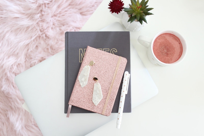 office, girly, book, label, flower, page, fur, alphabet, table, drink, directly above, refreshment, still life, indoors, plant, file folder, beside, 2K