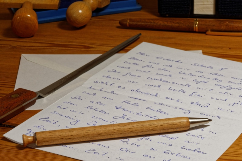 pen, book, table, paper knife, letters, handwriting, publication, page, paper, 2K, open, desk, no people, still life, text, communication, stamp, indoors