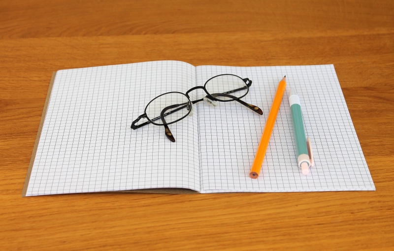 glasses, notebook, write, pencil, no people, eyeglasses, starting school, paper, wood grain, directly above, office, high angle view, note pad, furniture