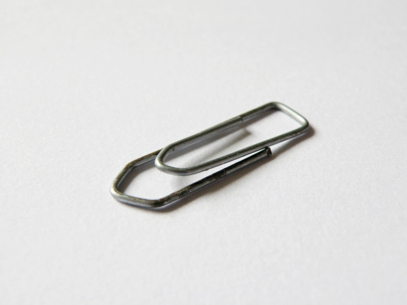 indoors, 2K, steel, close-up, exclusion, paper clip, white background, clip, organization, single object, no people, cut out, alloy, paperclip, attached