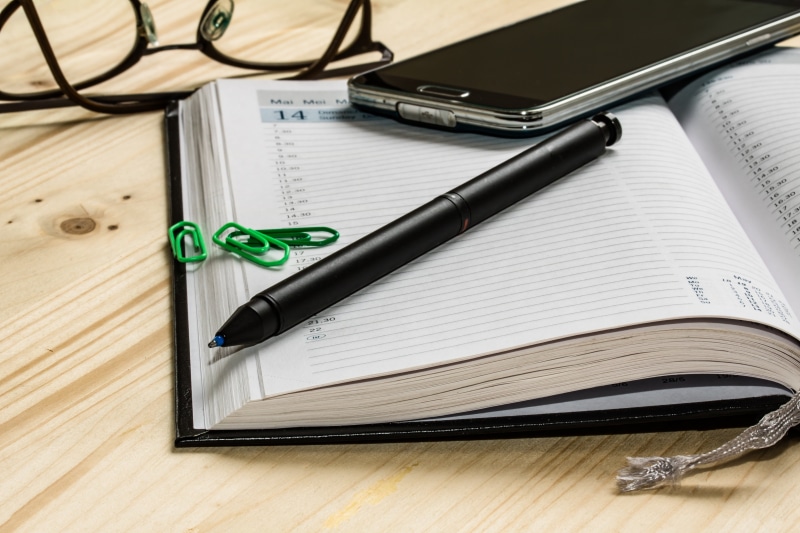 mobile phone, writing instrument, open, forward, top, diary, wood - material, day, office supplies, focus on foreground, fountain pen, three, learning