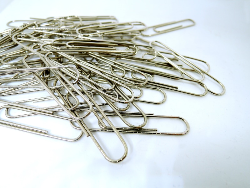 large group of objects, still life, cut out, office supply, silver colored, close-up, high angle view, clip, office, no people, studio shot, man made, stationery