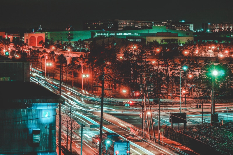 street light, lighted, night life, red, green, night, light, transportation, tokyo disneyland, instagram, road, town, building, photo, light trail, illuminated