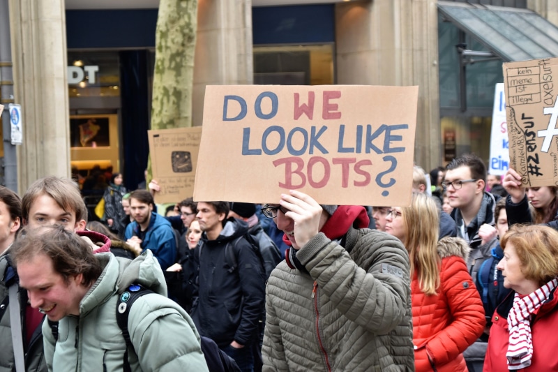 person, demonstration, 5K, protest, sign, city, activist, apparel, global, group of people, cardboard, germany, woman, women, standing, look, message