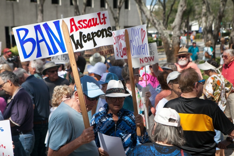 4K, social issues, city, violence, ban, protestor, text, assault, communication, gun, dom, real people, men, protest, group of people, crowd, people, women
