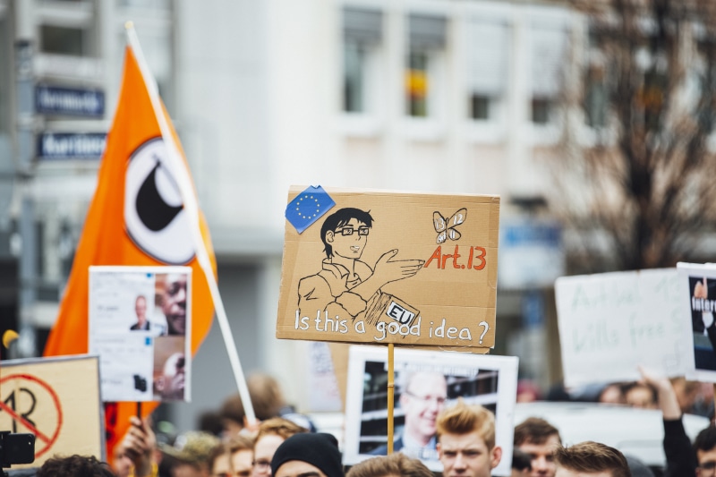 aggression, group of people, commerce, architecture, real people, action, meeting, education, concept, flag, movement, day, protest, activist, text, blur