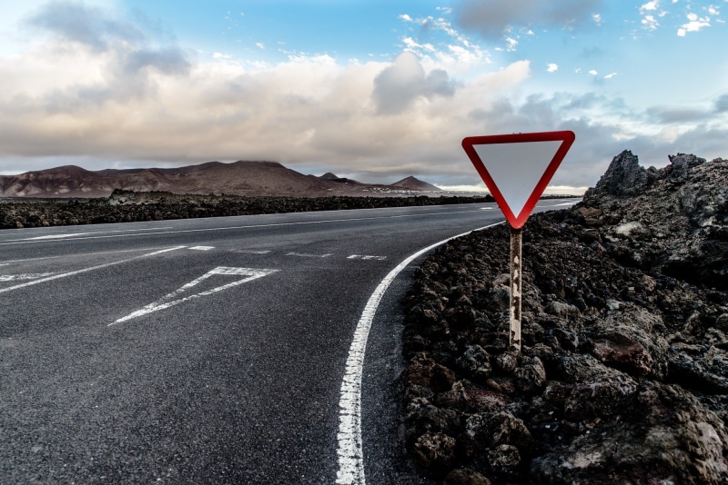 symbol, no people, signage, scenics - nature, sky, yield, 1080P, nature, el golfo, mountain, red, the way forward, road, outdoors, travel, communication
