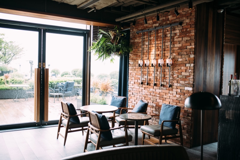 seat, entrance, trading floor, wood, no people, table, absence, business, design, patio, architecture, electric lamp, service, indoors, door, wooden, house