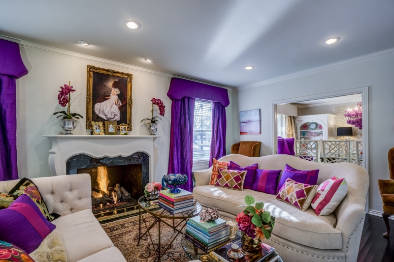 window, fireplace, sofa, no people, chair, inside, trading floor, indoors, purple, coffee table, table, room, architecture, electric lamp, lighting equipment