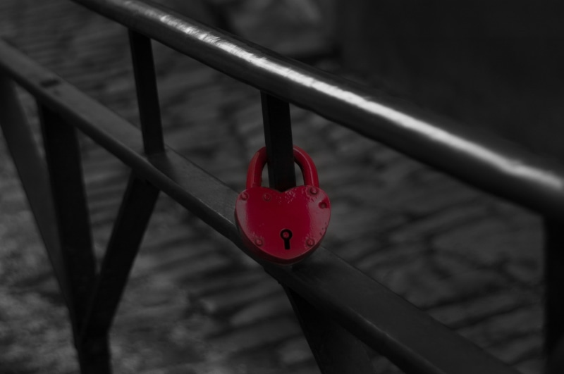 security, selective coloring, focus on foreground, lock, heart, day, red, positive emotion, close-up, metal, hanging, 2K, love, outdoors, padlock, railing