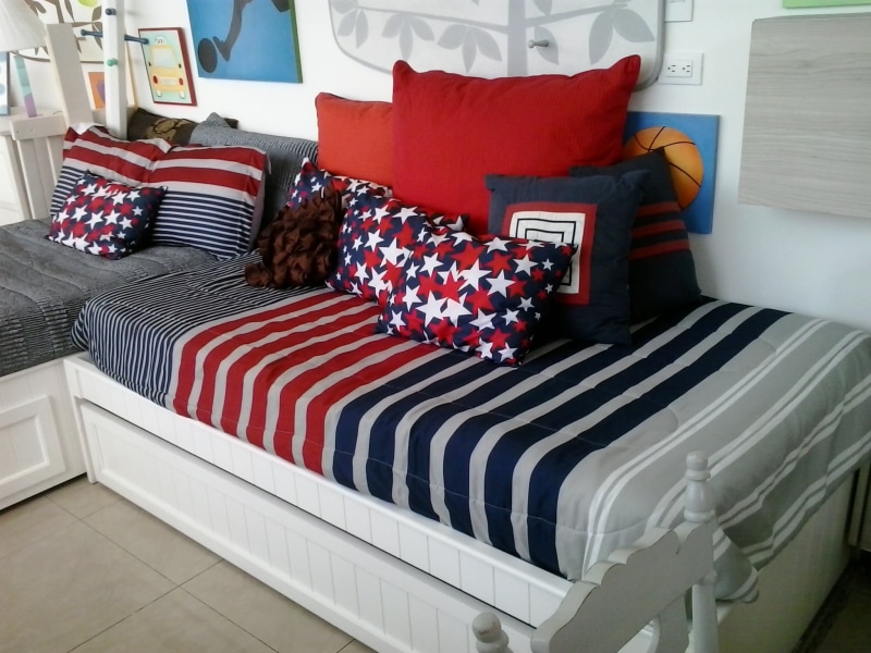 domestic room, bed, home interior, cushion, indoors, no people, relaxation, pillow, bedroom, cozy, patriotism, flag, striped, day, red, children, white color
