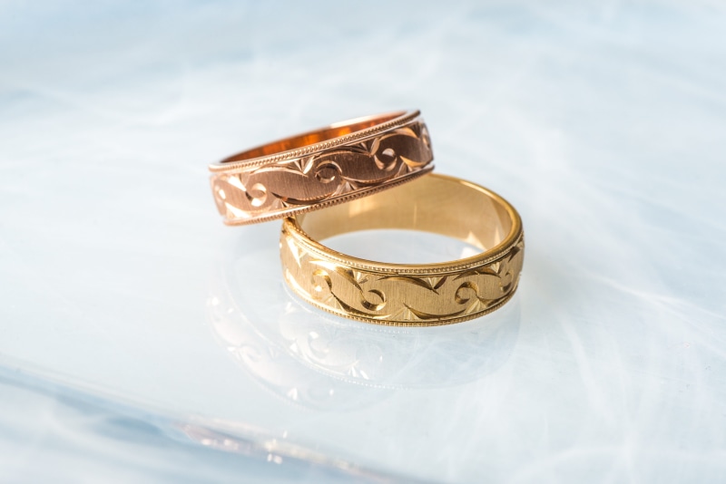 rose gold, silver colored, two objects, happy, forever, wedding ring, colored, no people, celebration, high angle view, close-up, metal, expense, emotion
