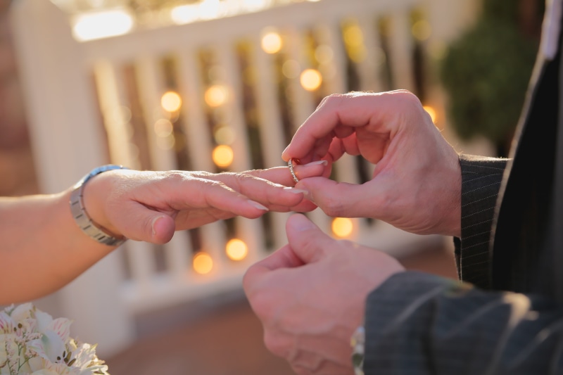 positive emotion, two people, real people, celebration, body part, human body part, lifestyles, human hand, marriage, wedding ceremony, finger, jewelry