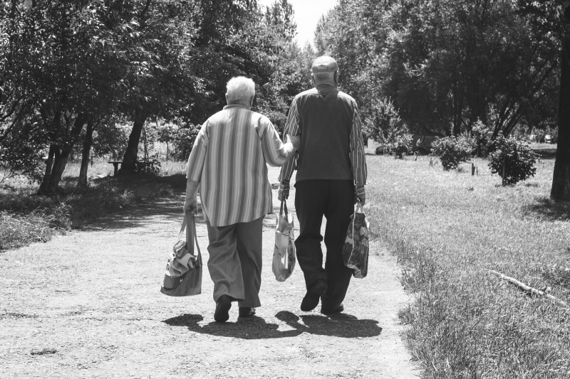 man, positive emotion, road, bonding, support, full length, life, old, elder, senior couple, couple - relationship, dirt, happy, stroll, couple, plant