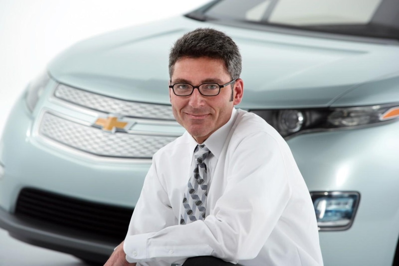 looking at camera, smiling, sales occupation, menswear, males, men, transportation, car, adult, 720P, portrait, salesman, production, chevrolet, glasses