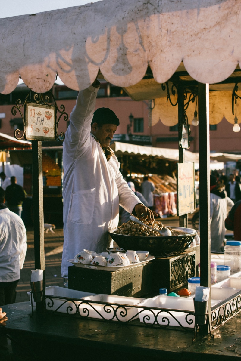 one person, retail display, market stall, marrakech, choice, day, occupation, adult, daytime, for sale, apparel, spice, business, person, plant, medina