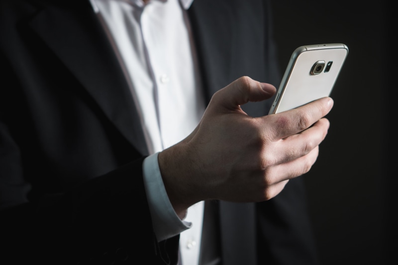 smartphone, human hand, classy, businessman, business, phone, real estate agent, outdoors, coat, marketing, communication, telephone, email, receiving