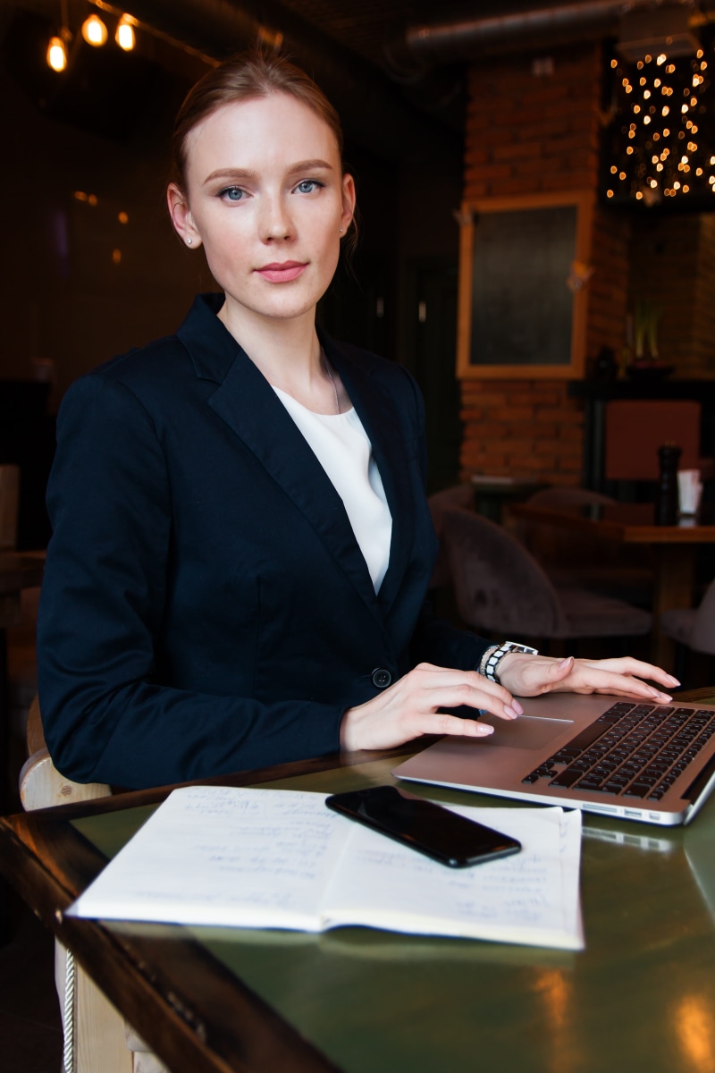 smile, businesswoman, executive, waist up, laptop, computer, technology, wireless technology, professional, young adult, lady, 4K, girl, sitting, corporate