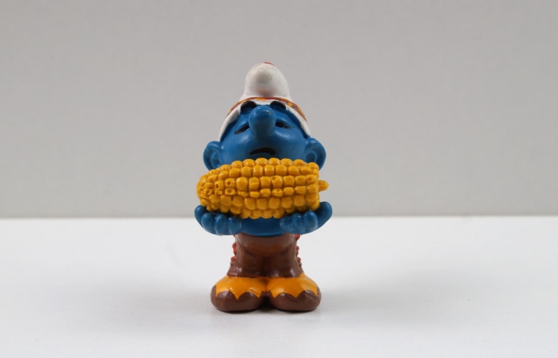 toys, no people, white background, indoors, studio shot, toy, human representation, colored background, figure, indian sahib, indulgence, temptation, sweet food