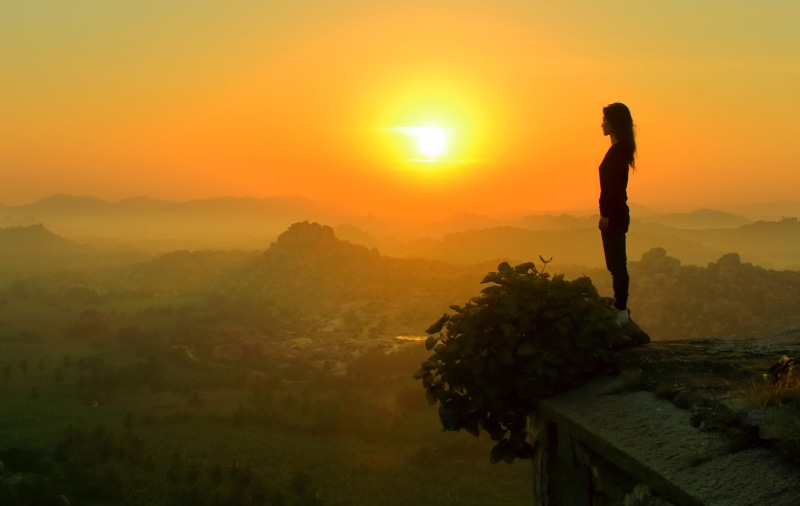sky, looking at view, real people, watching sunrise, nature, hampi, adventure, plant, orange color, tourism, tourist, idyllic, female, sun, outdoors, woman