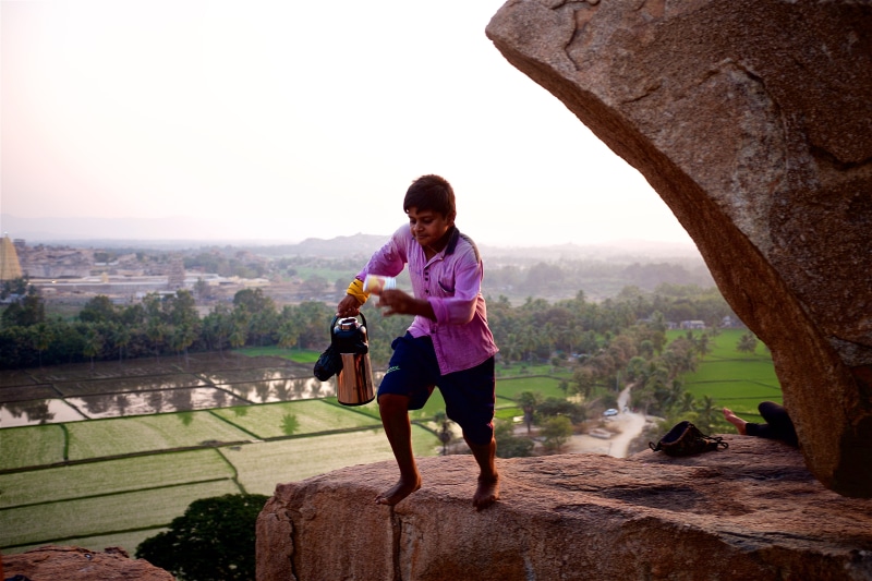 sky, domestic, outdoors, thermo, kid, leisure activity, green, real people, india, shirt, full length, terrace, chai, domestic animals, fearless, day, child