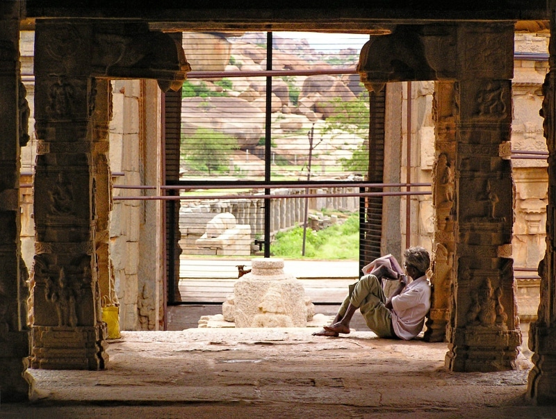 world heritage, places of interest, window, architecture, architectural column, india, sitting, building exterior, hindu, karnataka, adult, faith, hampi