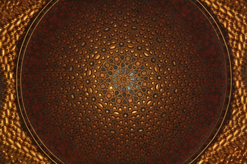 low angle view, geometric shape, seville, no people, floral pattern, cupola, circle, textured, spain, alcazar, built structure, ceiling, middle ages, sevilla