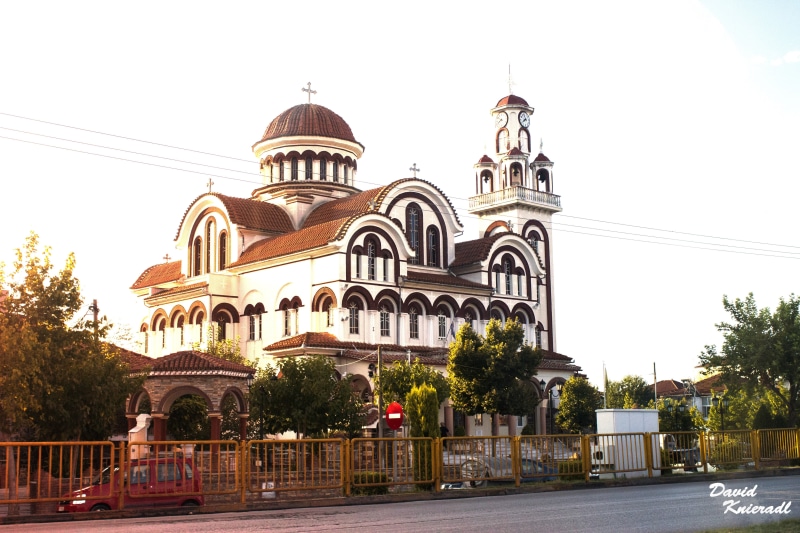 water, built structure, concrete, belief, temple, trees, summer, religion, place of worship, church, building exterior, beach, brown, white, dock, plant