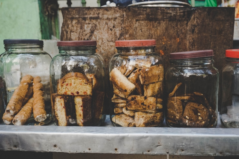 indiansweets, biscuits, close-up, for sale, glass - material, freshness, jars, table, chocolate, treats, calcutta, side by side, food and drink, day, street