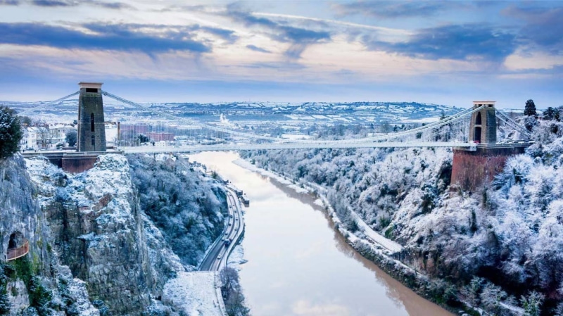 water, architecture, built structure, bridge, building exterior, frozen, city, no people, building, snowcapped mountain, beauty in nature, scenics - nature