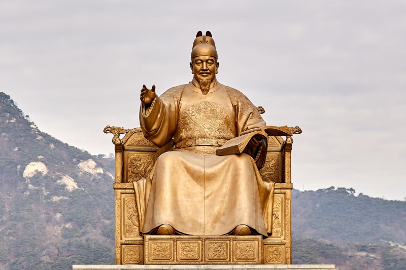 sculpture, metal, ancient, sitting, man, travel destinations, cloud - sky, yellow, representation, sejung, korea, male likeness, human representation, king