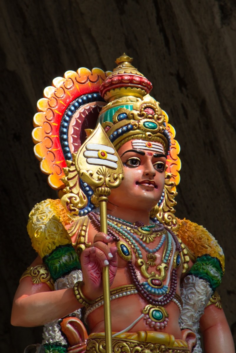 dancing, arts culture and entertainment, multi colored, clothing, statue, holding, traditional clothing, art and craft, portrait, headwear, cave, kong kuala