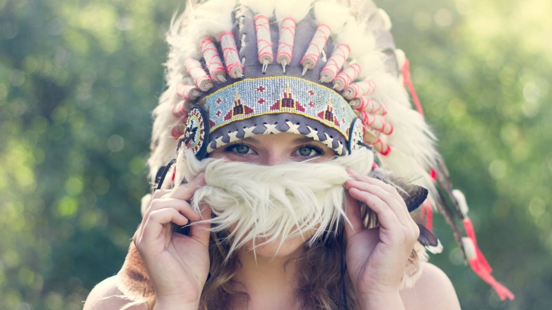 close-up, fur, red, cute, long hair, adult, white, women outdoors, headdress, brunette, human Face, hands, cultures, cheerful, elegance, headwear, feathers