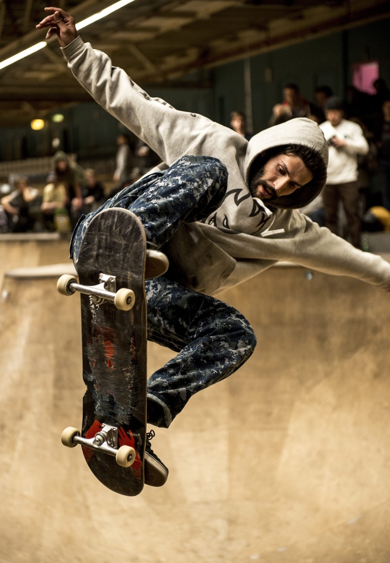 urban Scene, mid-air, muscular Build, city Life, incidental people, hoodie, only men, full length, one Person, indoors, lifestyles, outdoors, trick, arms raised