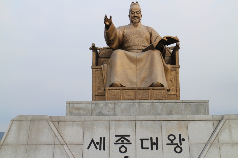 travel destinations, gwanghwamun, nature, human representation, low angle view, text, statue, memorial, sejong, the past, male likeness, built structure