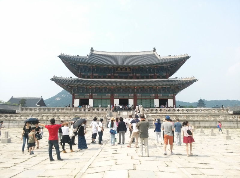 men, the past, outdoors, korea, cultural property, history, place of worship, sky, traditional, real people, Gyeongbok Palace, travel destinations, homes for sale