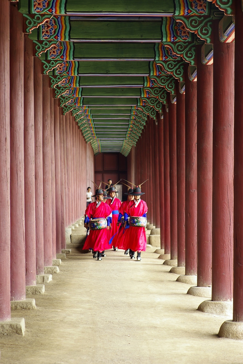 red, traditional, landscape, drums, lifestyles, architectural column, real people, indoors, colonnade, gyeongbok palace, built structure, people, pillars