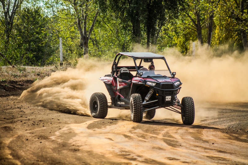 offroad, adults only, riding, 1000, plant, land, on the move, rzr, speed, buggy, sunlight, driving, beside, mode of transportation, men, drift, dust, sports utility vehicle