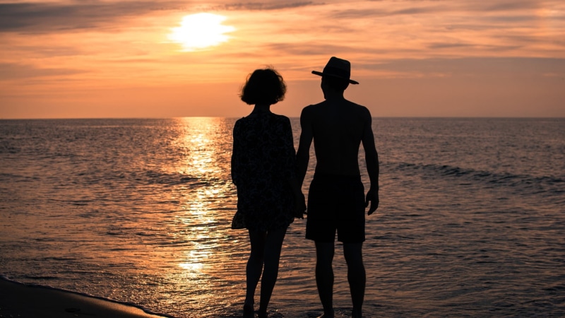 young Adult, relationships, nature, orange color, leisure Activity, women, happiness, hands, adult, sun, positive emotion, walking, twilight, sky, romance