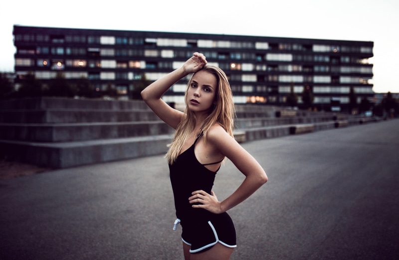 holding, fashion, hair, Jonathan Goehler, building exterior, clothing, shorts, dolphin, young adult, women outdoors, standing, women, beauty, blonde, long hair