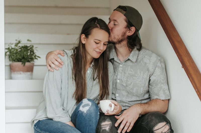cheerful, casual, outdoors, minimal, kiss, plant, residential Building, romance, family, home, adults Only, women, hug, stairwell, coffee cup, stair, looking