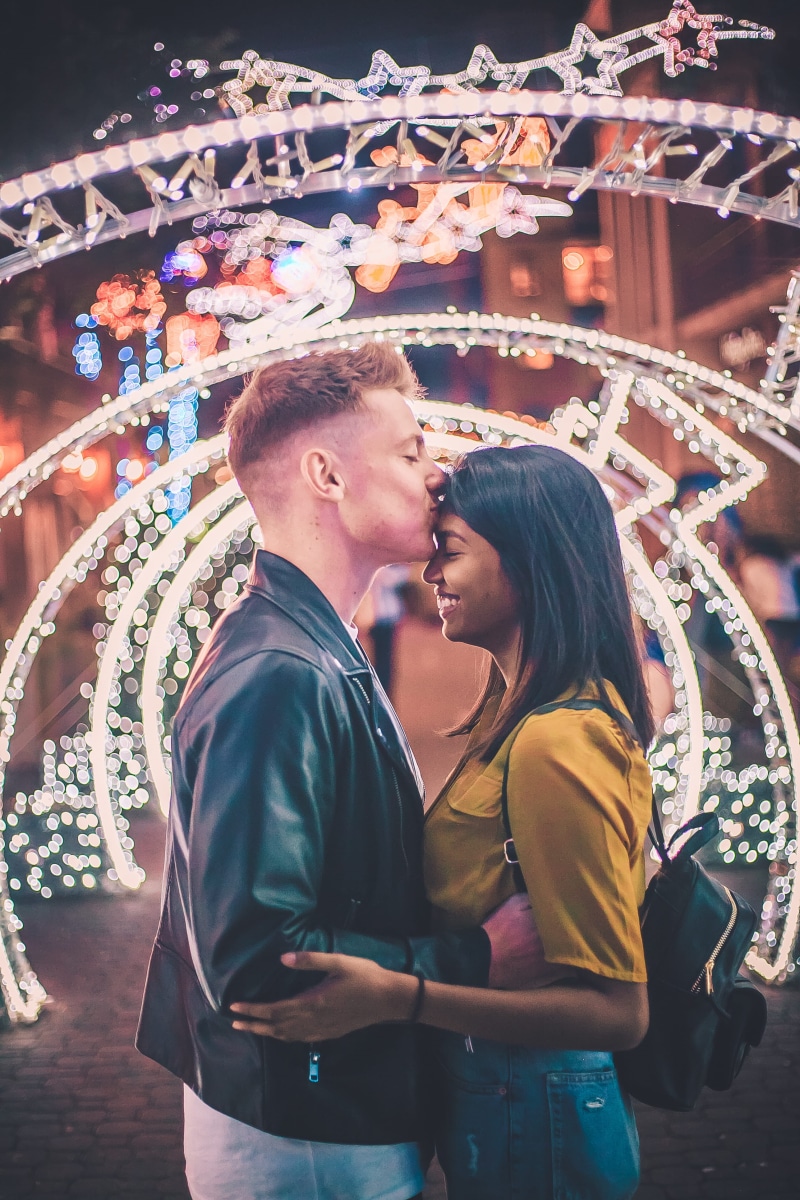 standing, love, emotion, couple - relationship, illuminated, outdoors, leisure activity, light, surrounded, 4K, young adult, woman, positive emotion, women