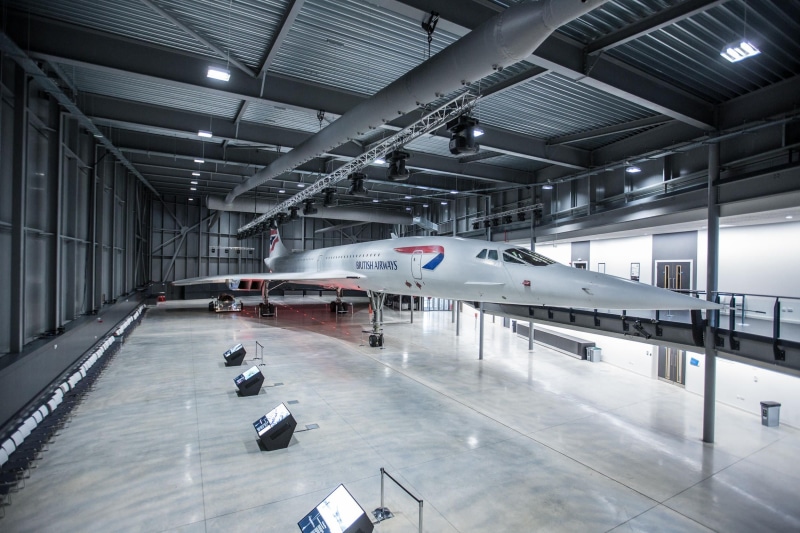 indoors, ceiling, airplane hangar, architecture, built structure, transportation building - type of building, Bristol, sign, no people, transportation