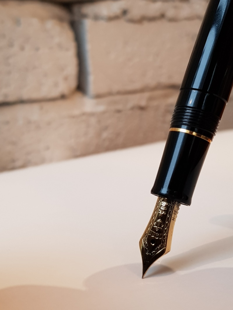 indoors, fountain pen, gold, writing instrument, black, paper, 4K, communication, nib, focus on foreground, simplicity, ink, writing, office supply, pen